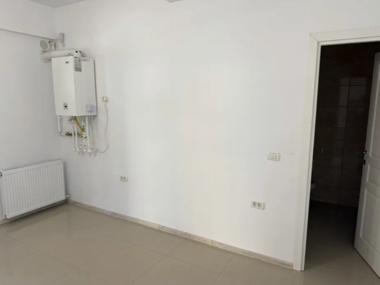 Spatiu comercial 25 mp., loc de parcare proprietate